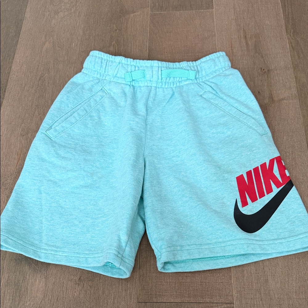 Nike Kids Light Blue Shorts with Red Logo